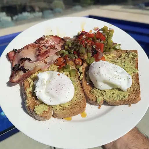 Poached Eggs on Avocado Toast with Sautéd Vegetables